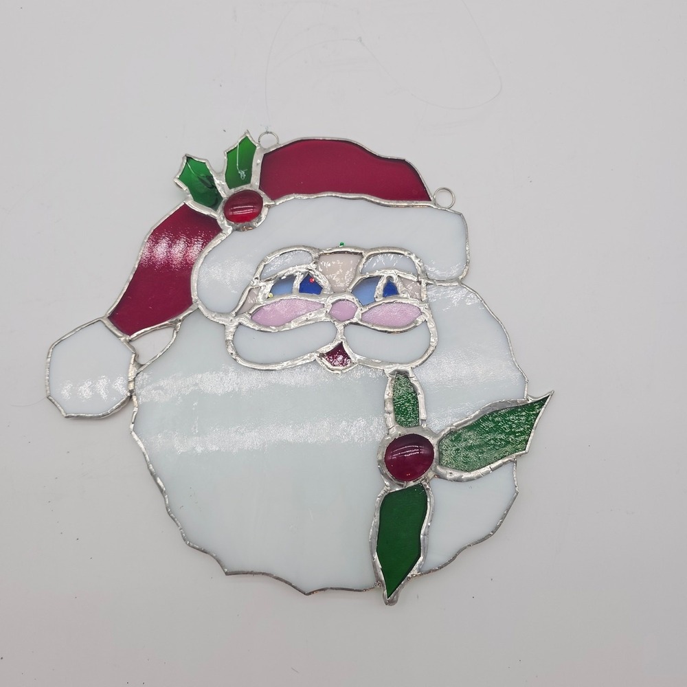Stained‎ glass Santa face with holly